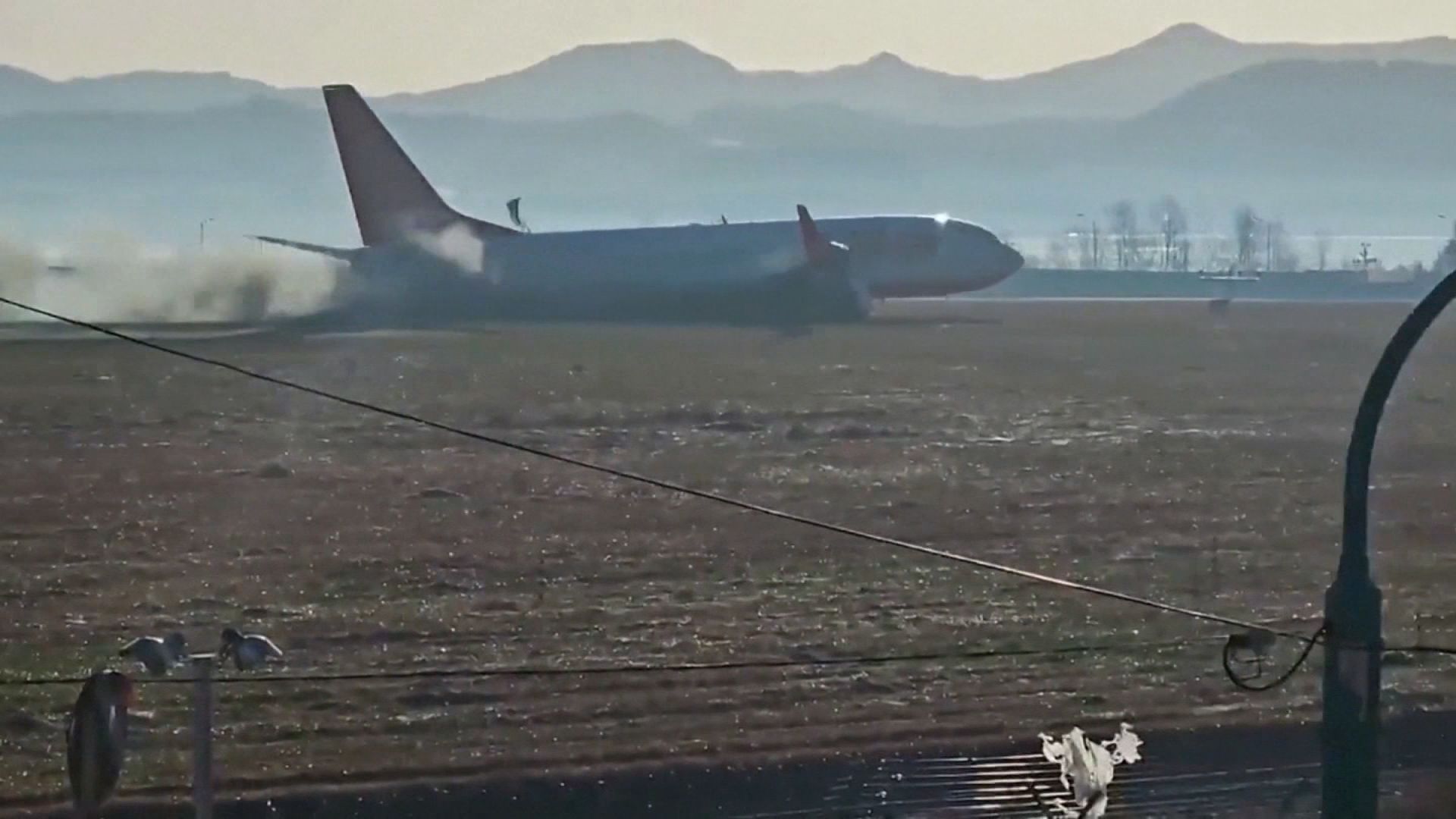 Flexjet aircraft on tarmac with premium terminal in background